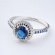 Timeless Beauty: Sparkling Silver Ring with a Stunning Blue Stone