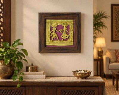 Dhokra-brass-wall-art-in-a-wooden-frame-above-an-elegant-console
